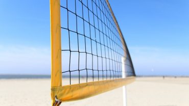 How High Should a Volleyball Net Be? (Men, Women, School, Beach)